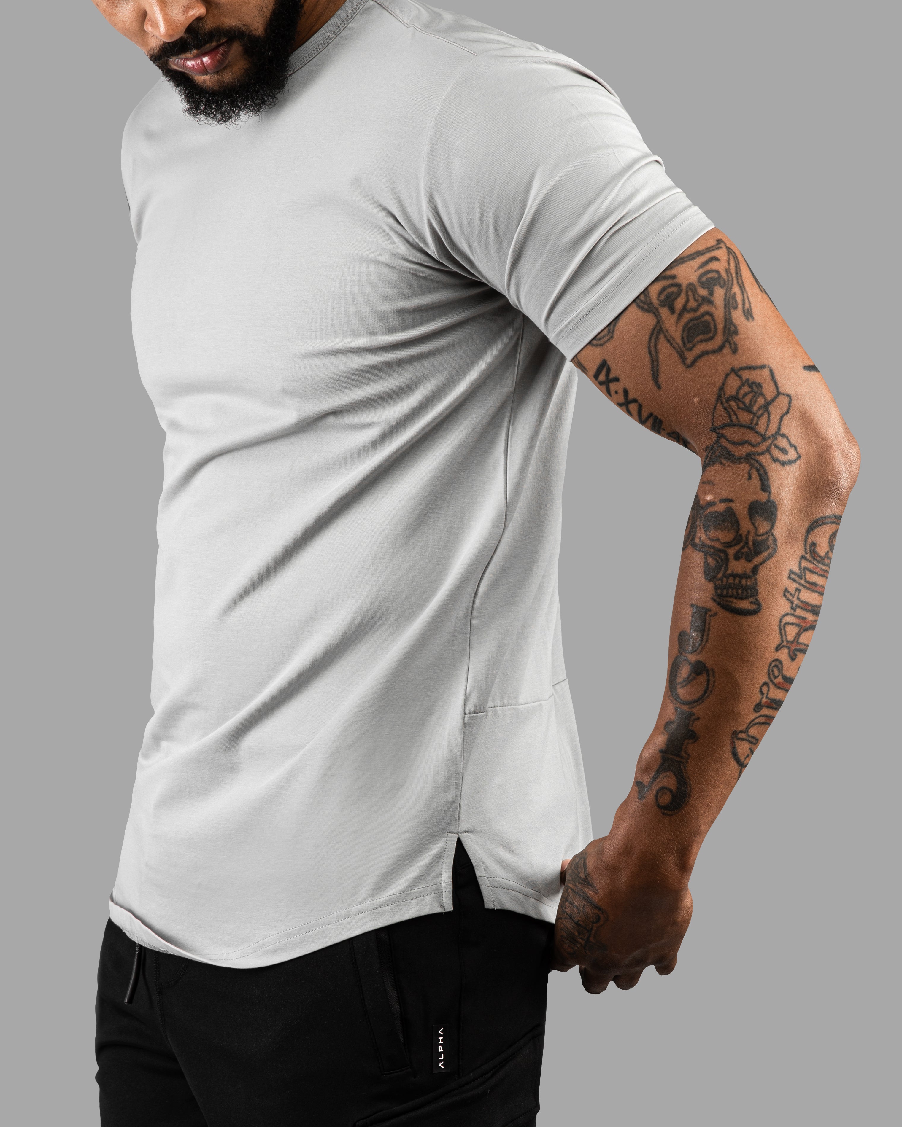 GROUNDED PERFORMANCE TEE – STONE